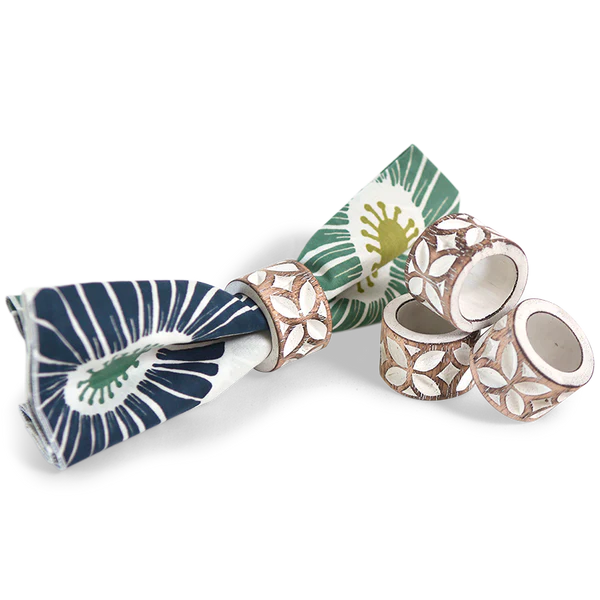 Carved wooden napkin rings