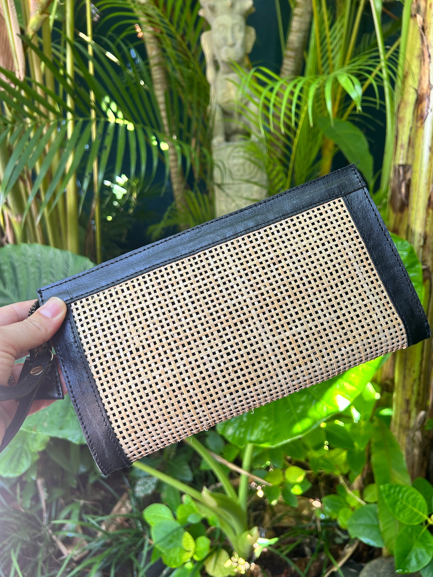 Shanti Clutch - Black leather and rattan