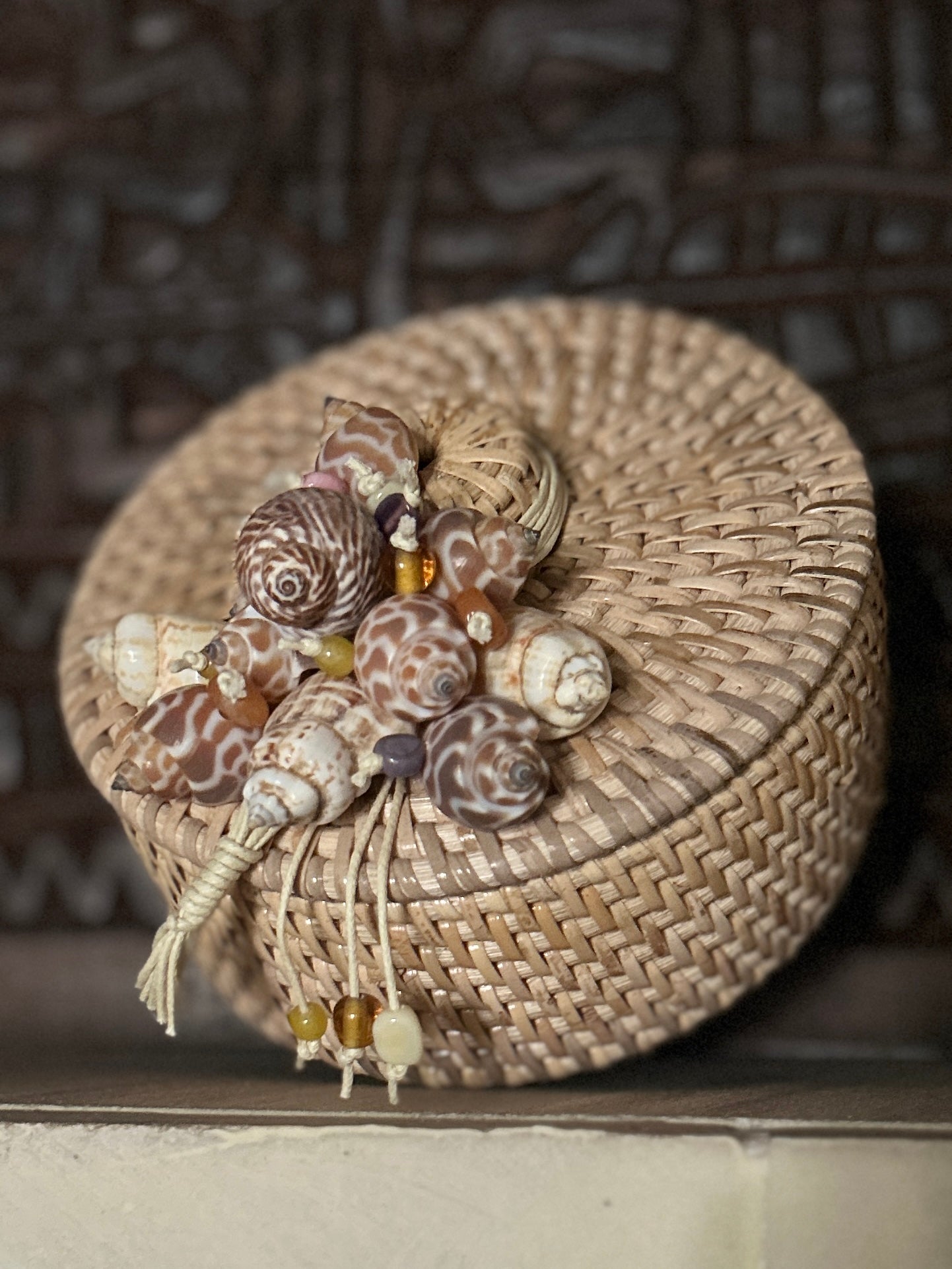 Rattan trinket box with shell lid